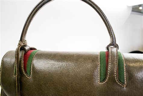 vintage brown suede gucci bag|vintage Gucci brown leather handbag.